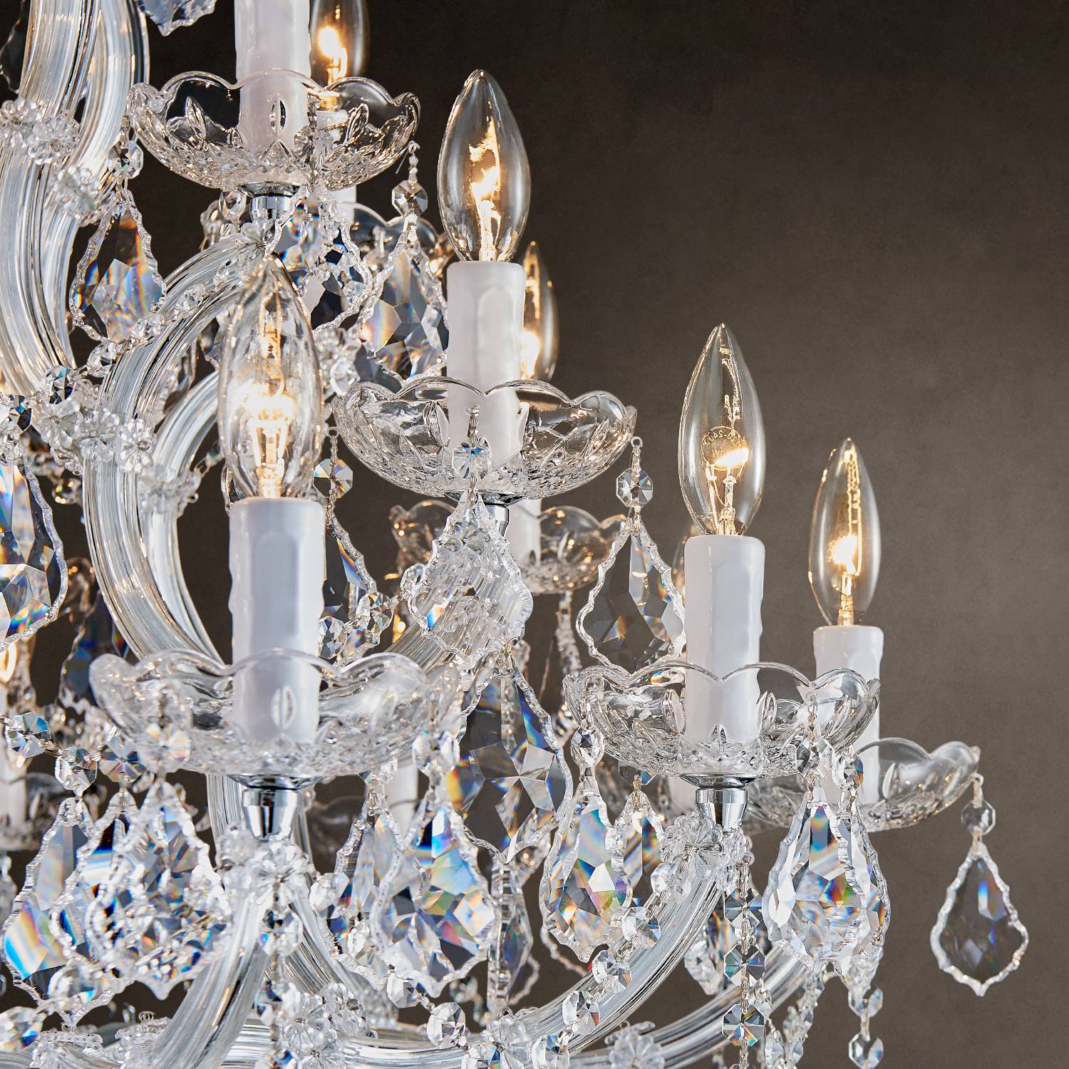 Close-up of candle-style lights and K9 crystals on Maria Theresa chandelier