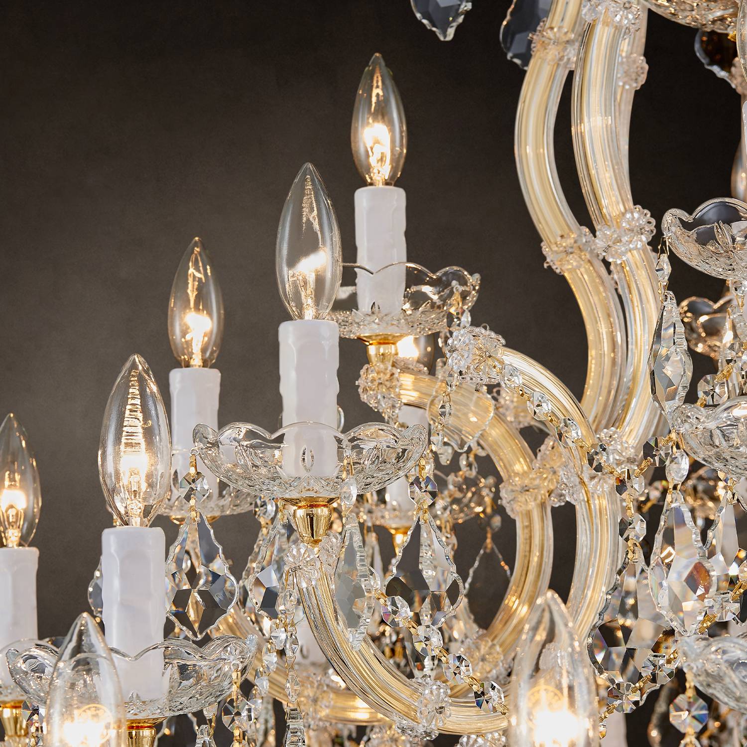 Close-up of candle-style lights and K9 crystals on Maria Theresa chandelier