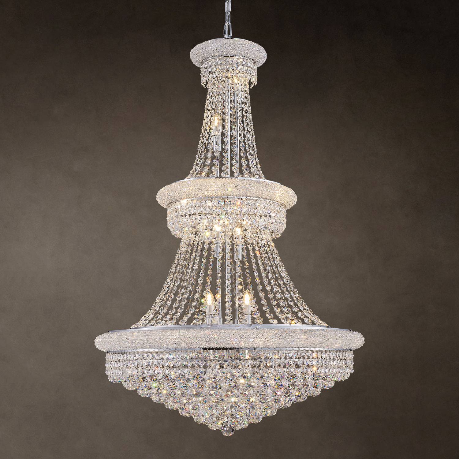 Empire silver K9 crystal chandelier hanging on dark background