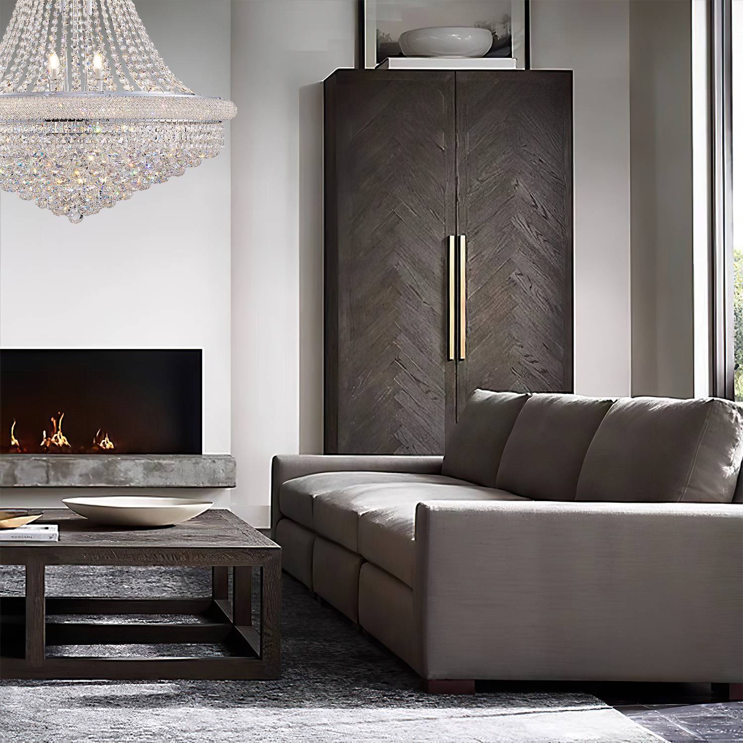 Empire silver chandelier in living room with fireplace