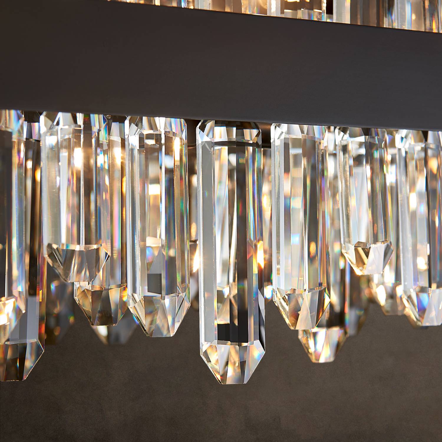 Close-up of black frame and K9 crystal prisms on rectangular chandelier