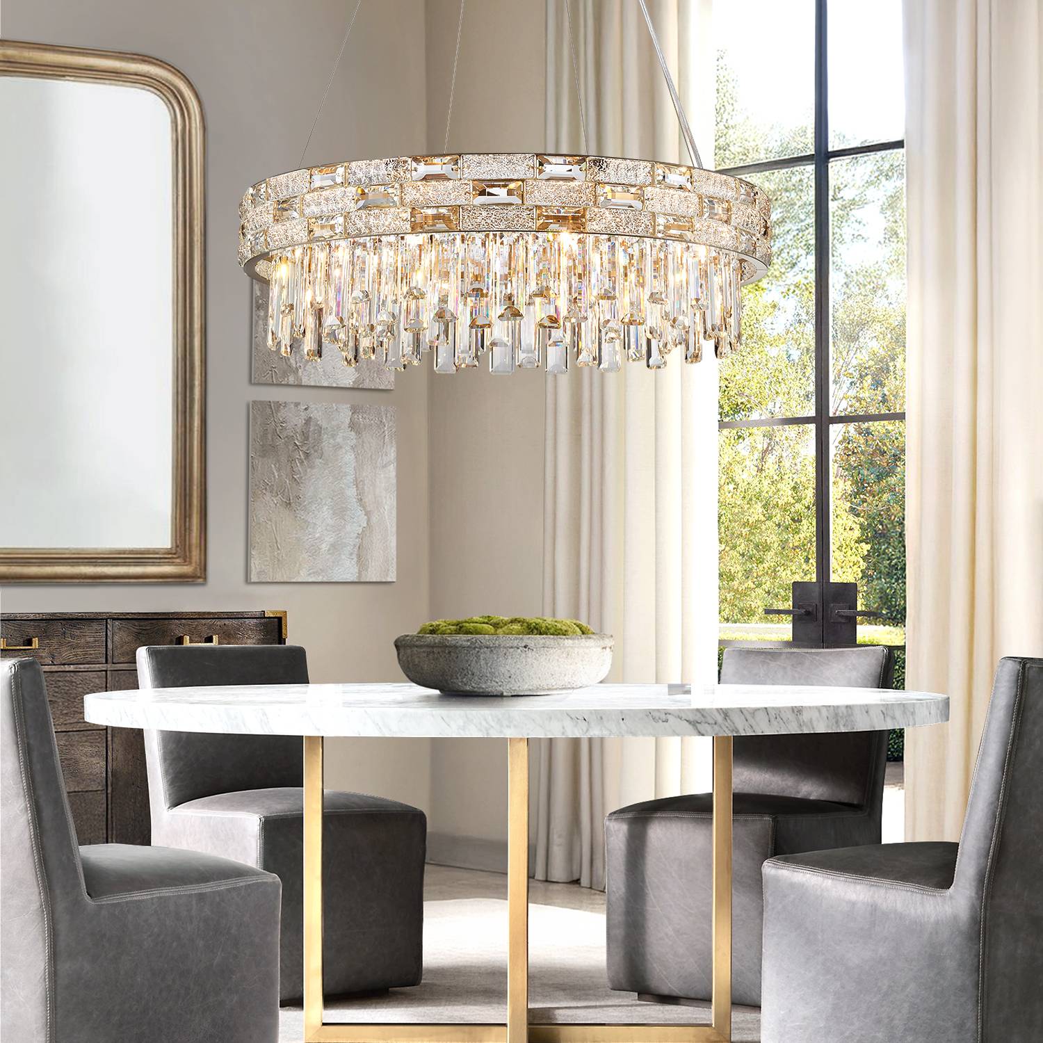 Round gold crystal chandelier above dining table