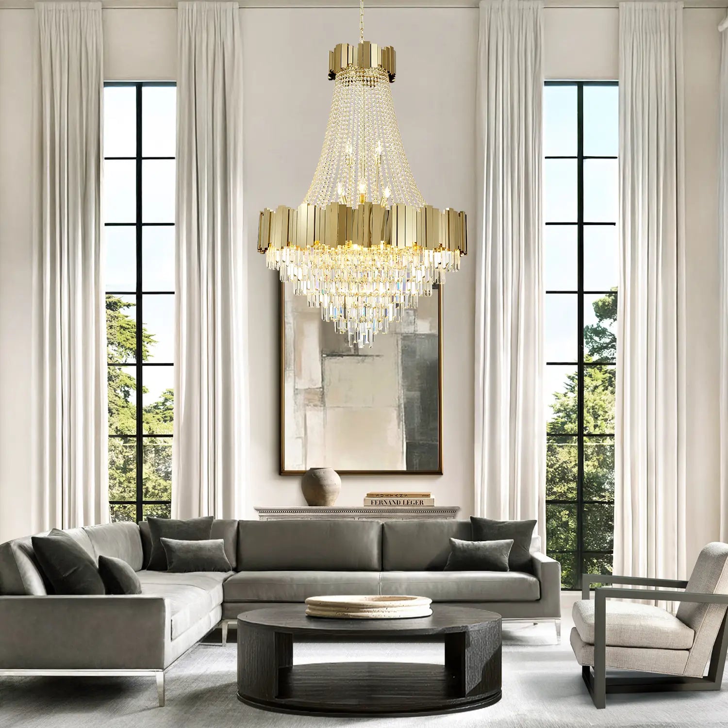 Large gold crystal chandelier in high ceiling living room