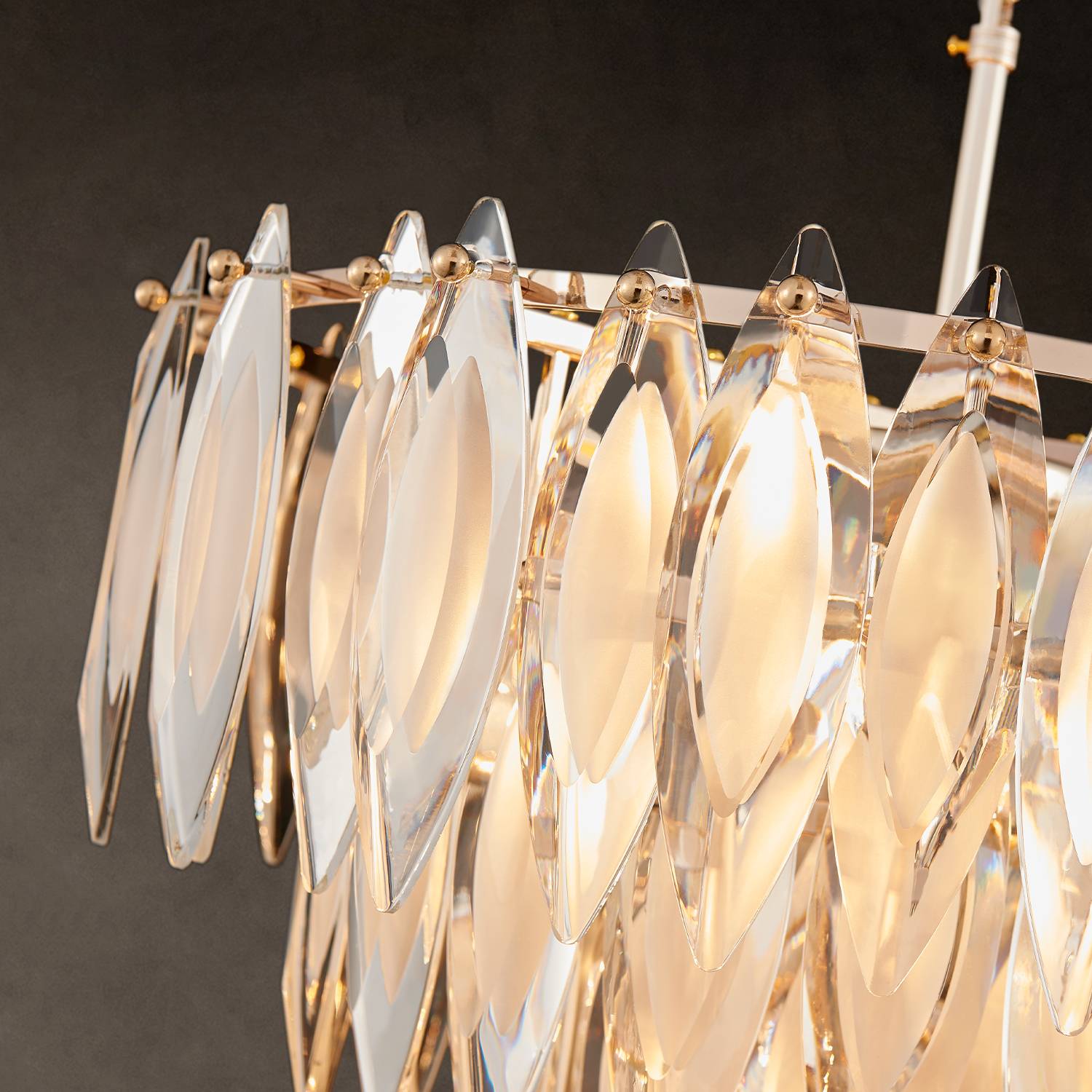 Close-up of leaf-shaped K9 crystal panels on chandelier