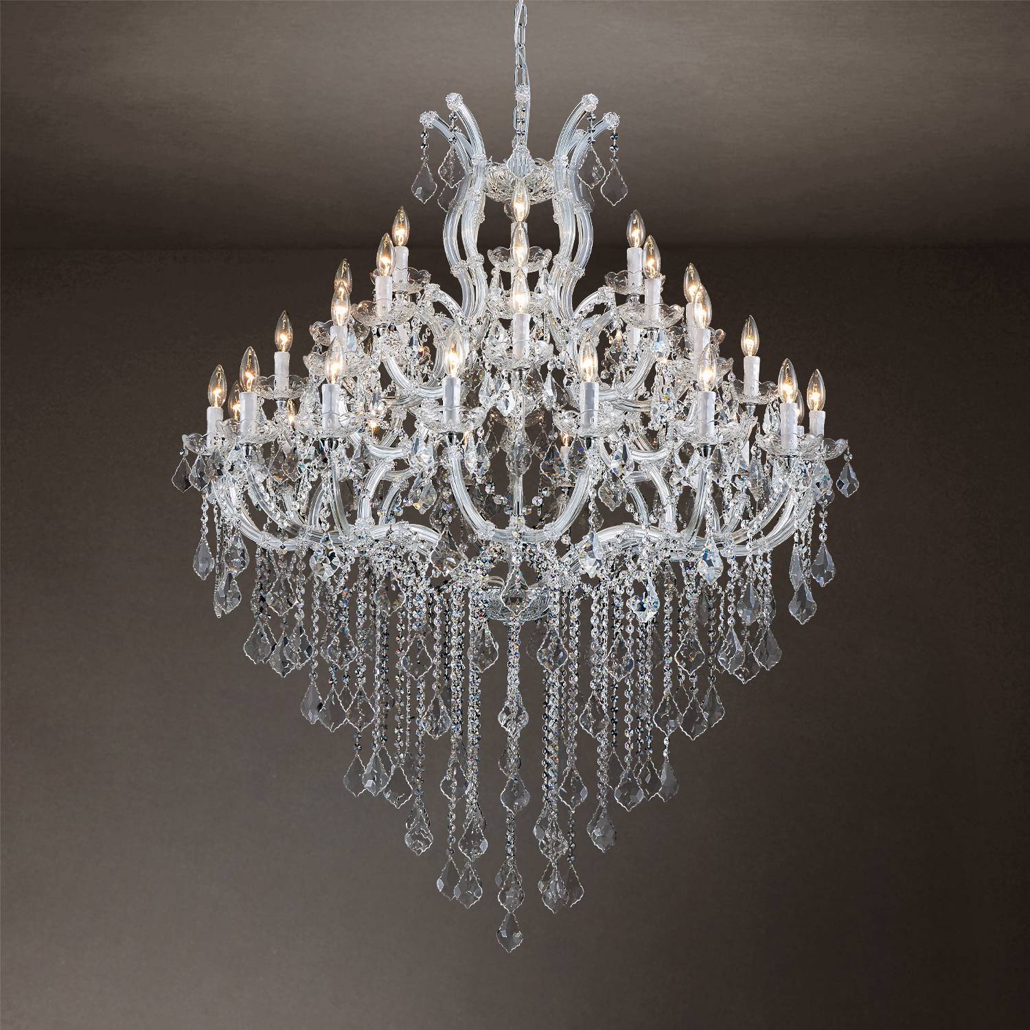 Silver Maria Theresa crystal chandelier with warm candle lights