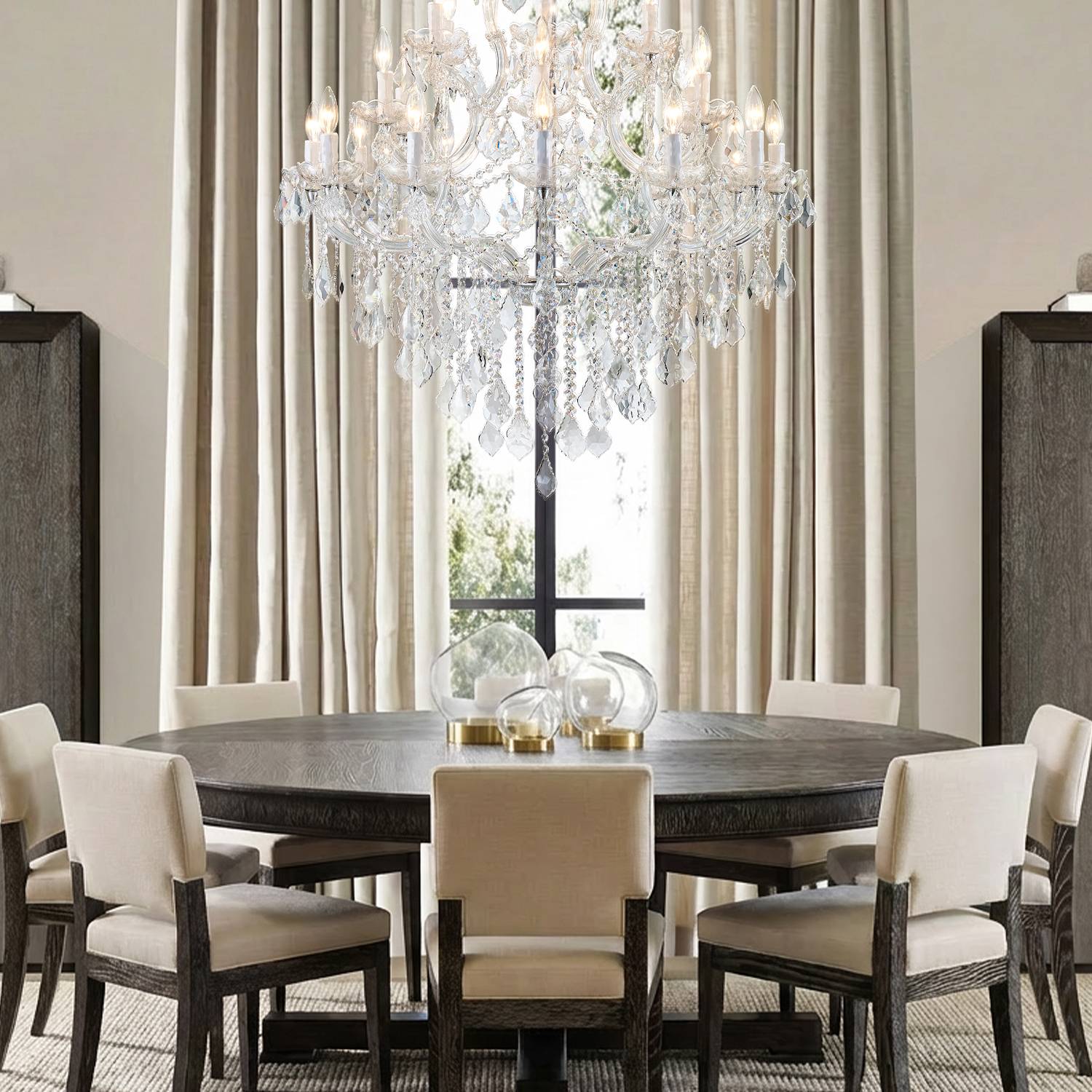 Maria Theresa chandelier above dining table in luxury dining room