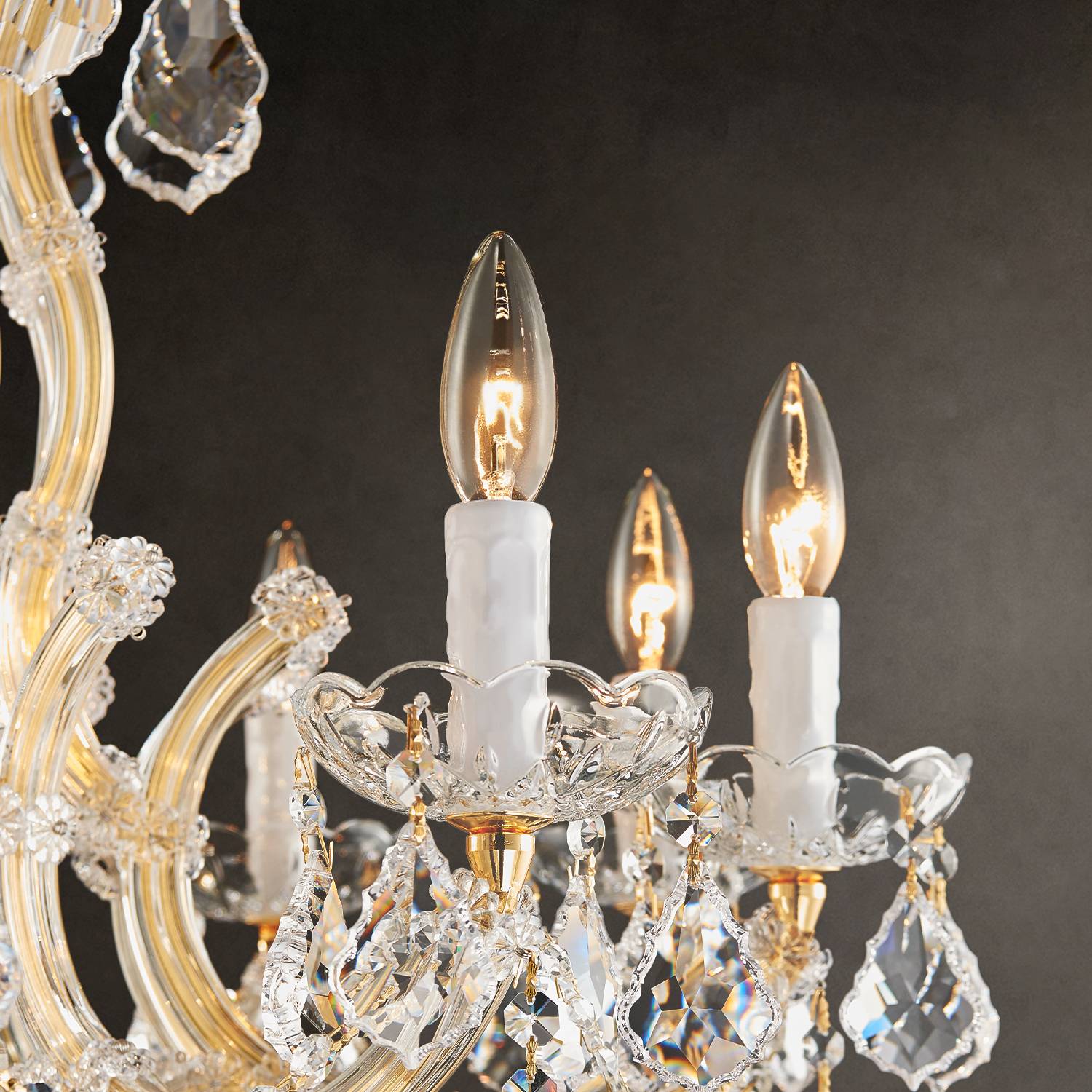 Gold Maria Theresa crystal chandelier above dining room table