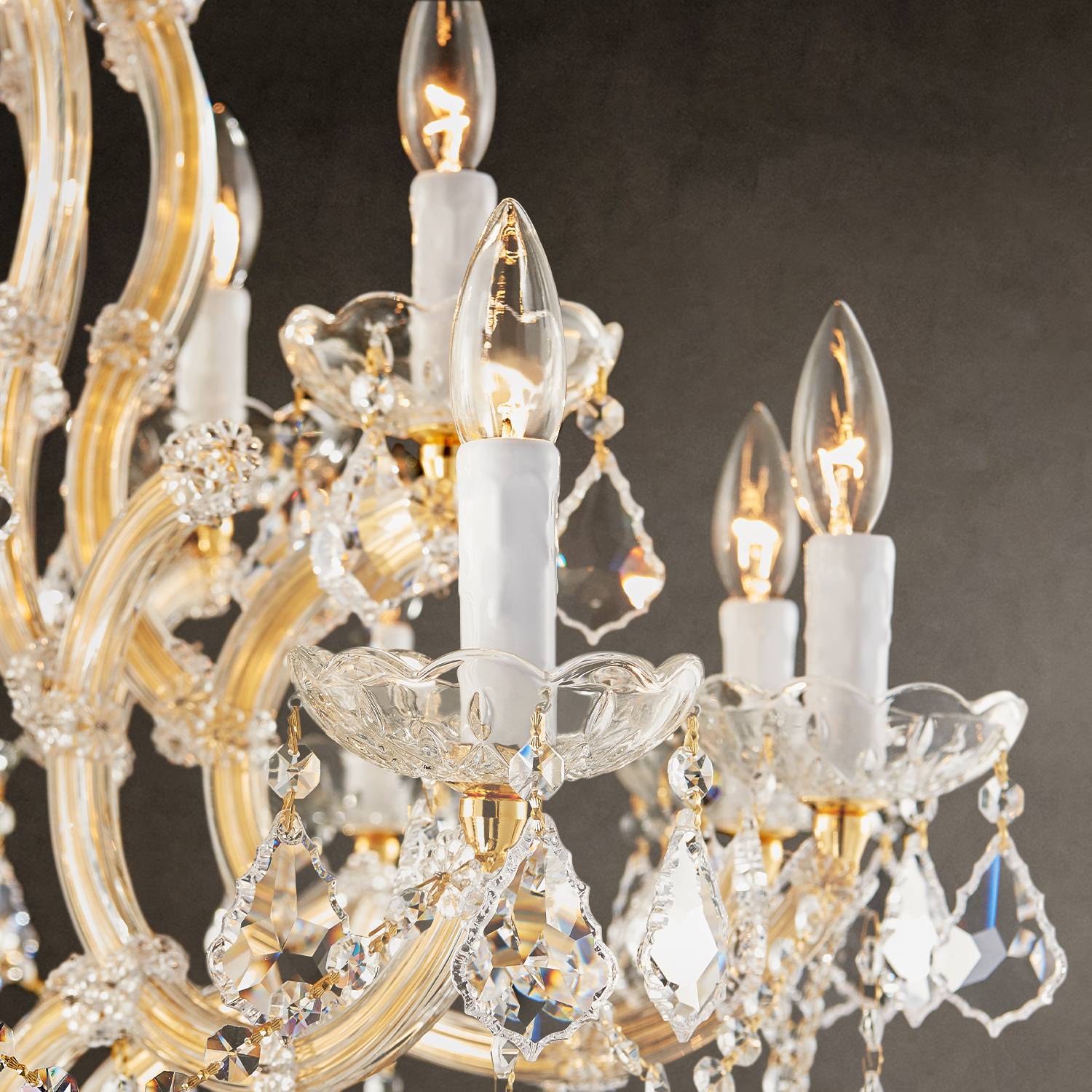 Close-up of candle-style lights and K9 crystals on Maria Theresa chandelier
