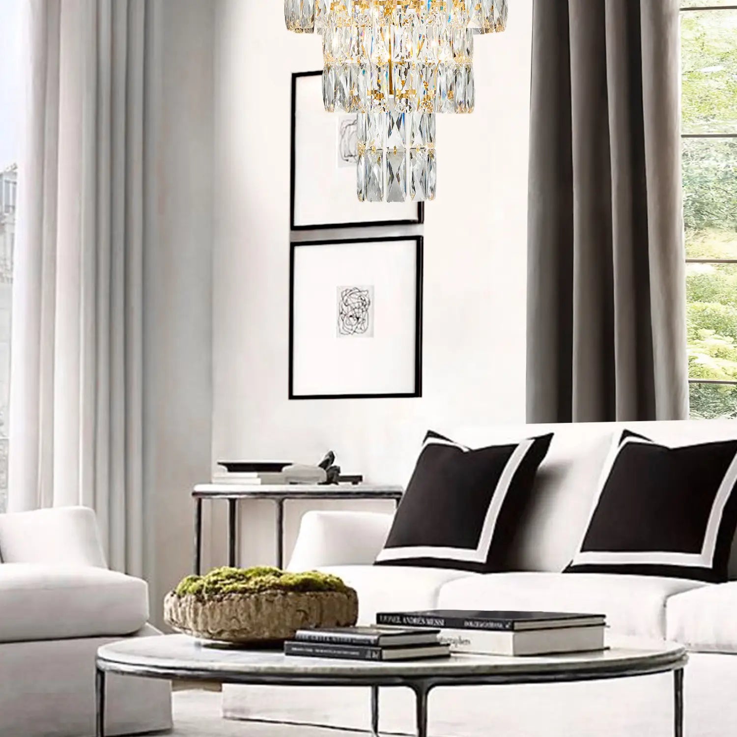 Gold K9 crystal chandelier above living room seating area