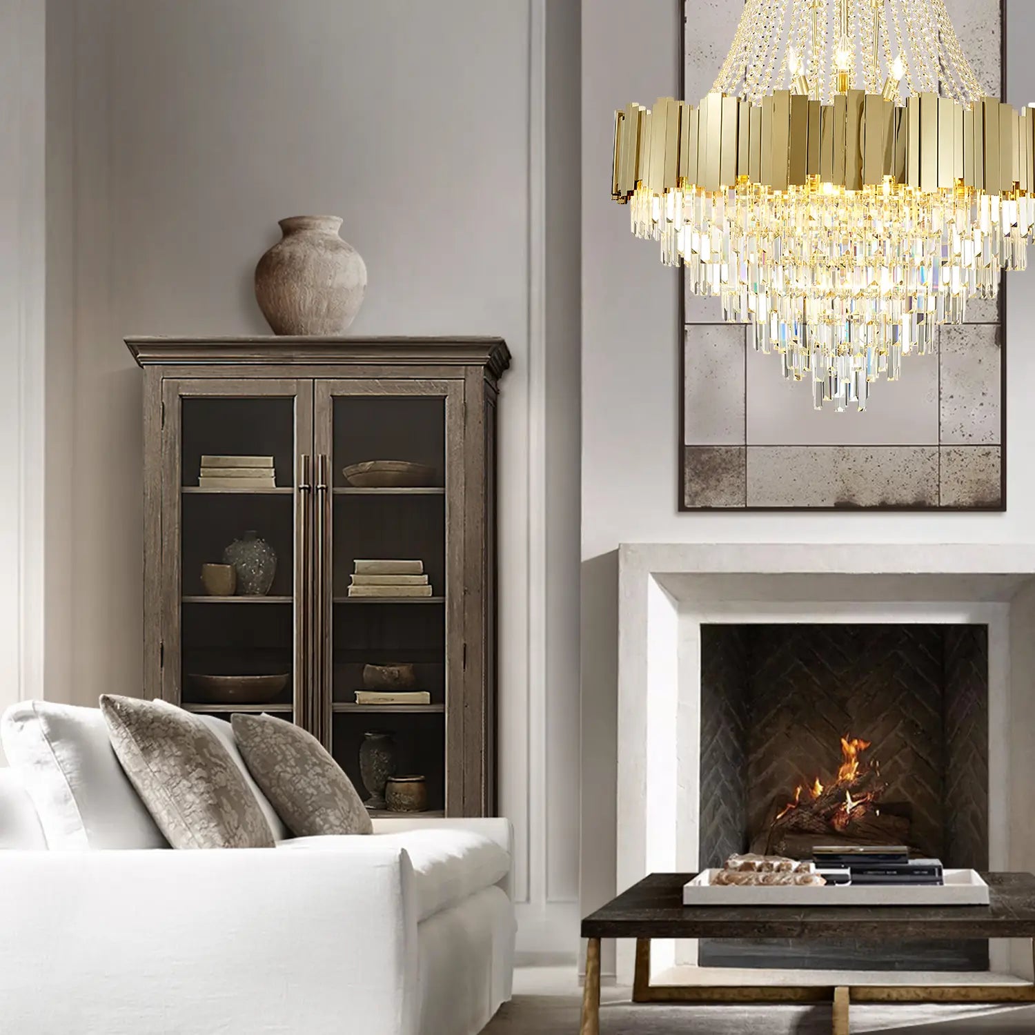 Large gold chandelier in living room with fireplace